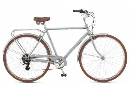 A classic step-over city bicycle with a silver frame, brown leather saddle, and brown tires, shown from a side profile on a white background.